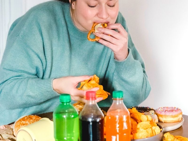 Women eating a large pile of food